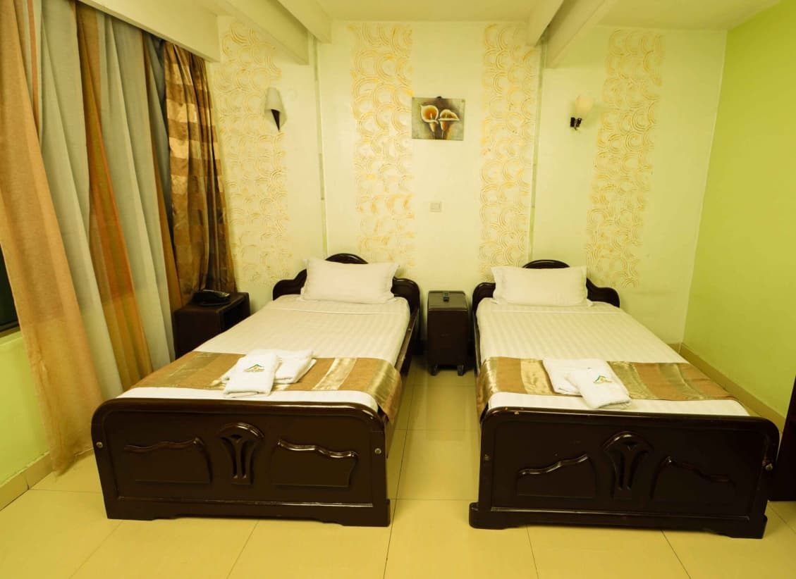 Comfortable guest room at Legacy Hotel Nakuru, a convenient option among Lake Nakuru lodges near Lake Nakuru National Park