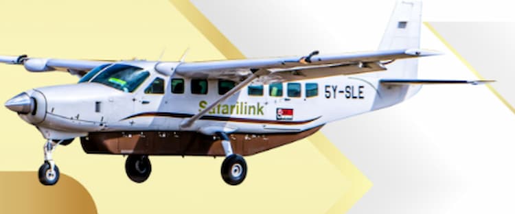 A Safarilink Cessna Caravan charter plane flying to Naishi Airstrip inside Lake Nakuru National Park, offering a 30-minute flight alternative from Nairobi.